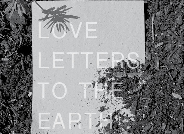 A piece of paper laying in woodchips, with the words "Love Letters to the Earth" superimposed over the image.