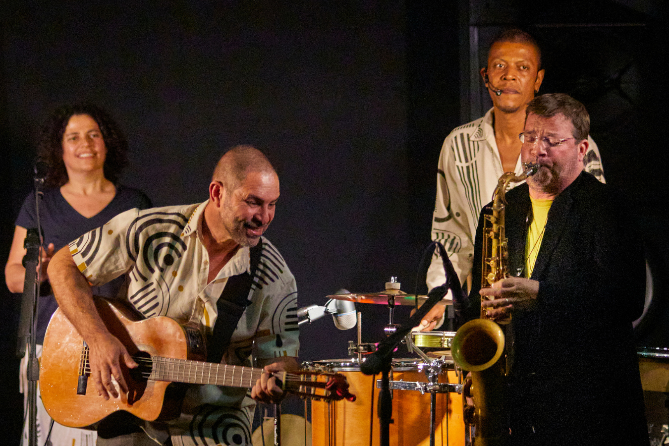 Paulo Padilha e Bando perform at the Princess Theater, joined on stage by local music teacher and saxophonist Dave Helms.