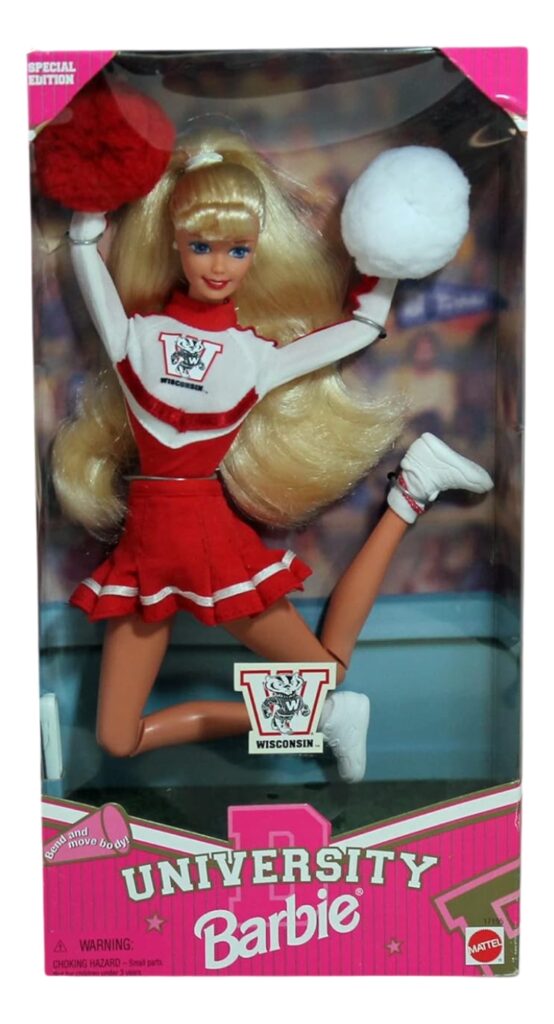 A Barbie, in a box reading "University Barbie" wearing a University of Wisconsin cheerleader uniform and holding red and white pom poms.