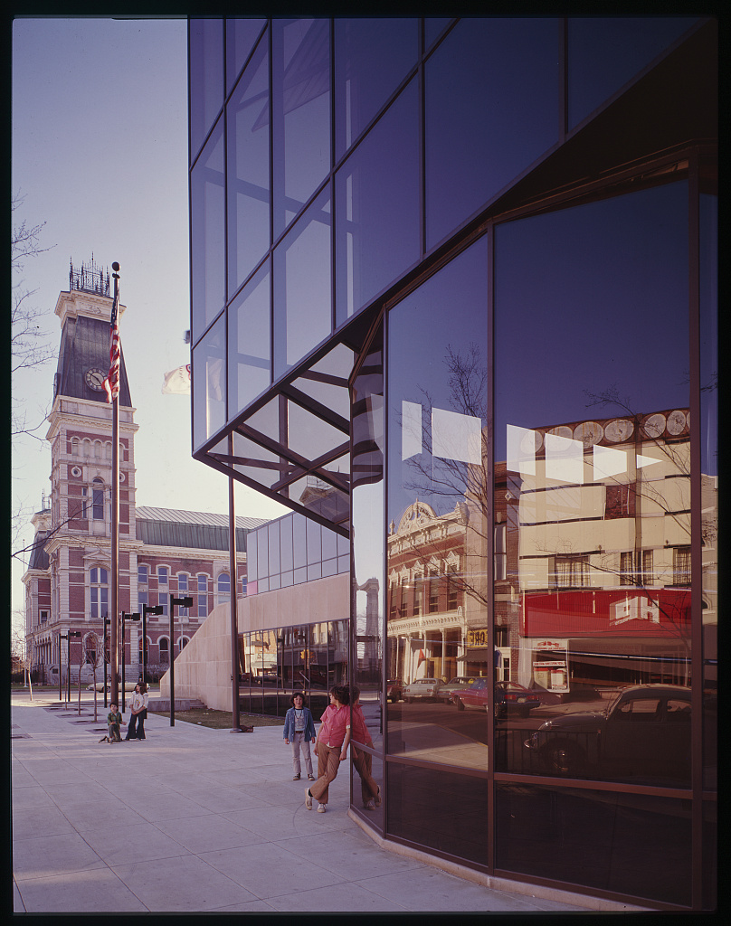 A building with an all-glass facade.