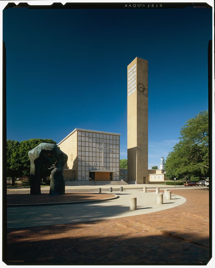 Two modernist architectural buildings with clean lines and squared up features.