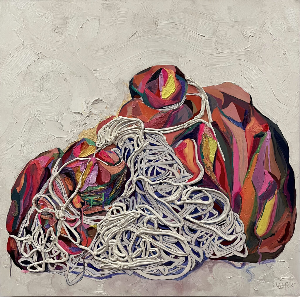 An image of a tangled mess of painted ropes around a rock
