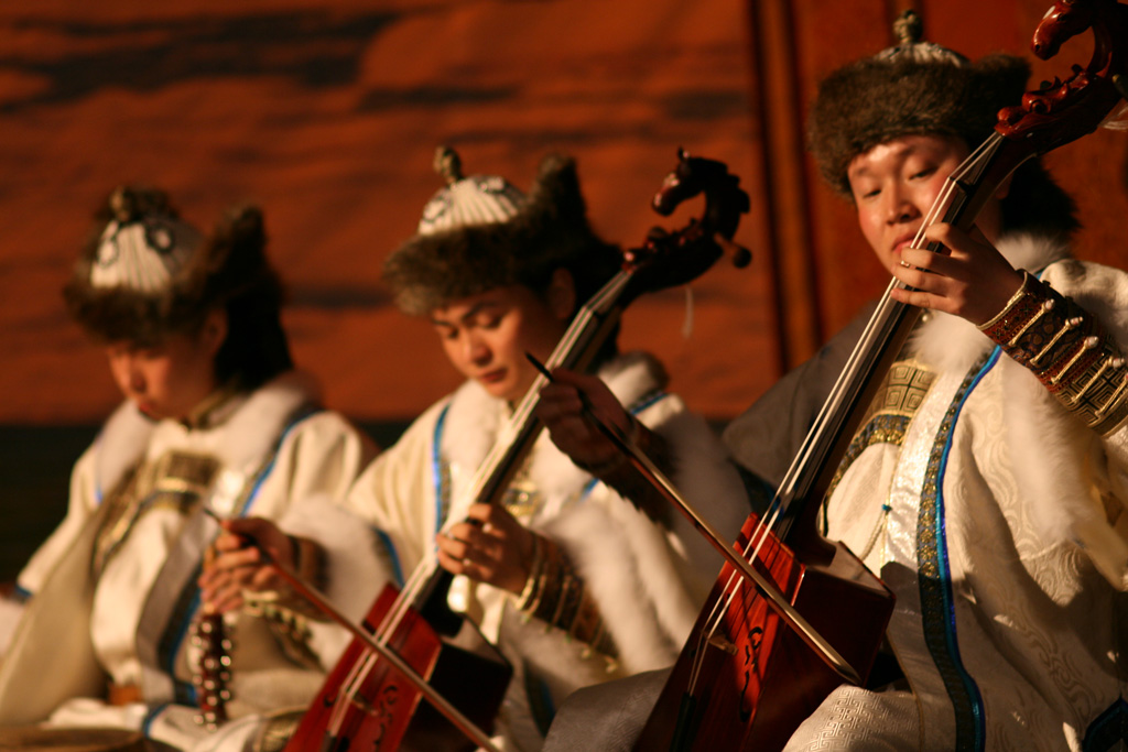 Members of An Da Union rock out on their horse head fiddles.