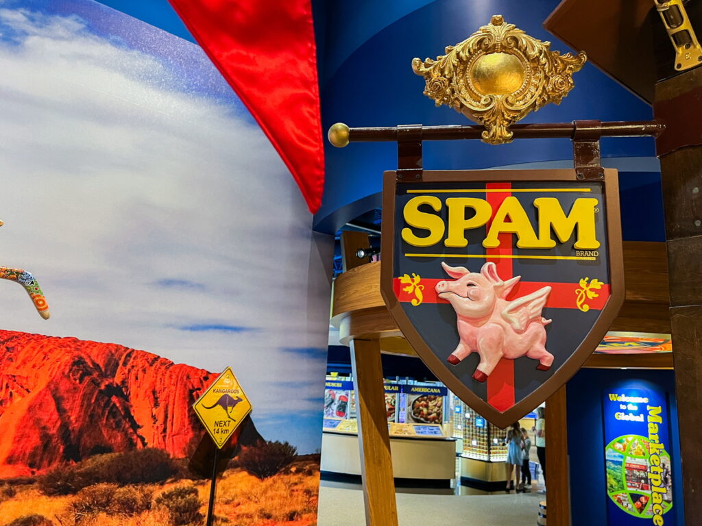 A pub sign with a winged pig, with the word "SPAM" above it.