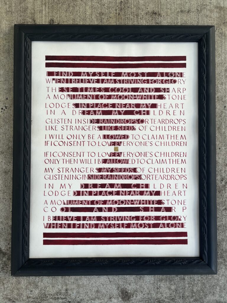 Text from Tracy K Smith's "Everybody's Autobiography" in red paint on a white background, framed.