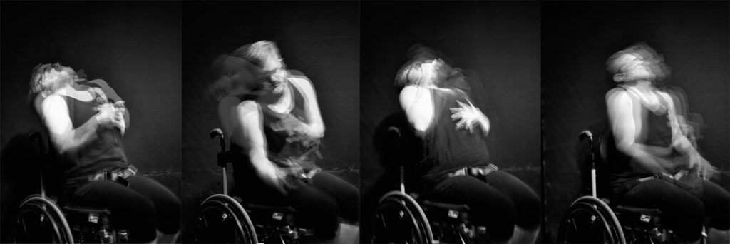 A series of four long-exposure photographs of a person in a wheel chair mid-seizure.