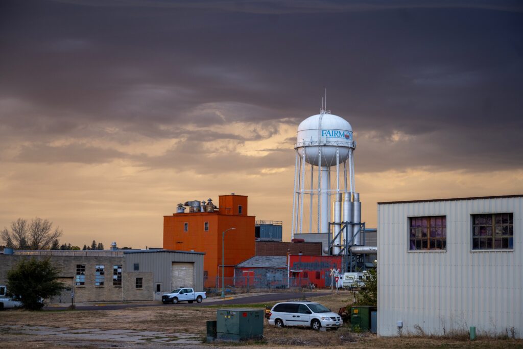 Fairmont's water tower surrounded by agricultural buildings