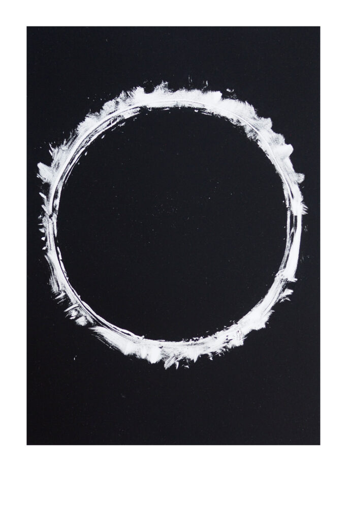 A white circle against a black background