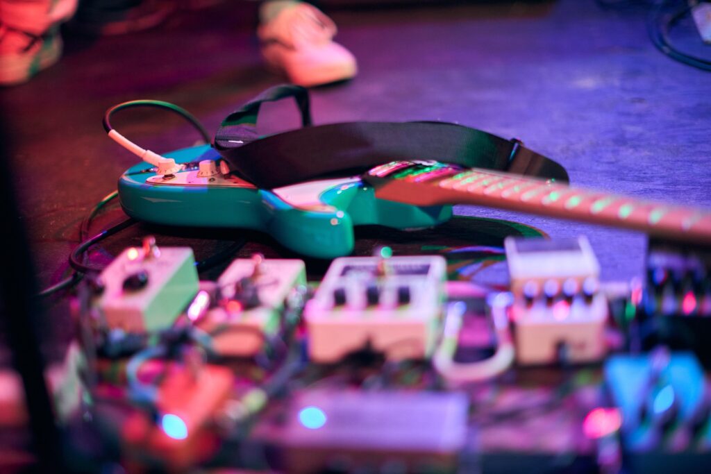 A guitar and pedal board.