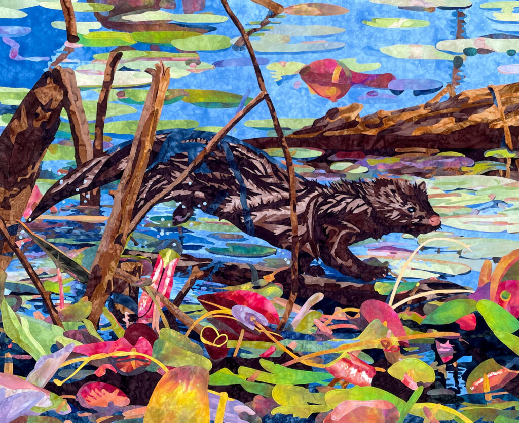 A brown mink with wet fur scurries across a log in a blue pond covered with bright green and pink lily pads.