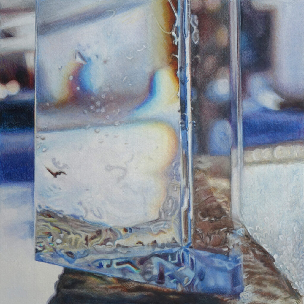 An abstract image of pale light and wintry blues refracted through a glassy prism.