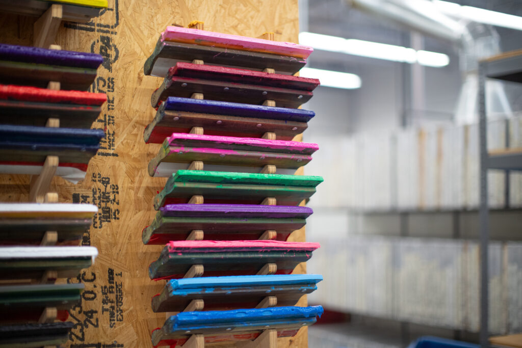 A stack of screenprinting frames.