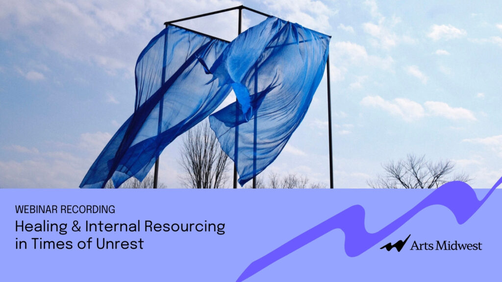 Text reads Webinar Recording Healing and Internal Resourcing in Times of Unrest. Public art piece of giant blue fabric in wind on square frame.
