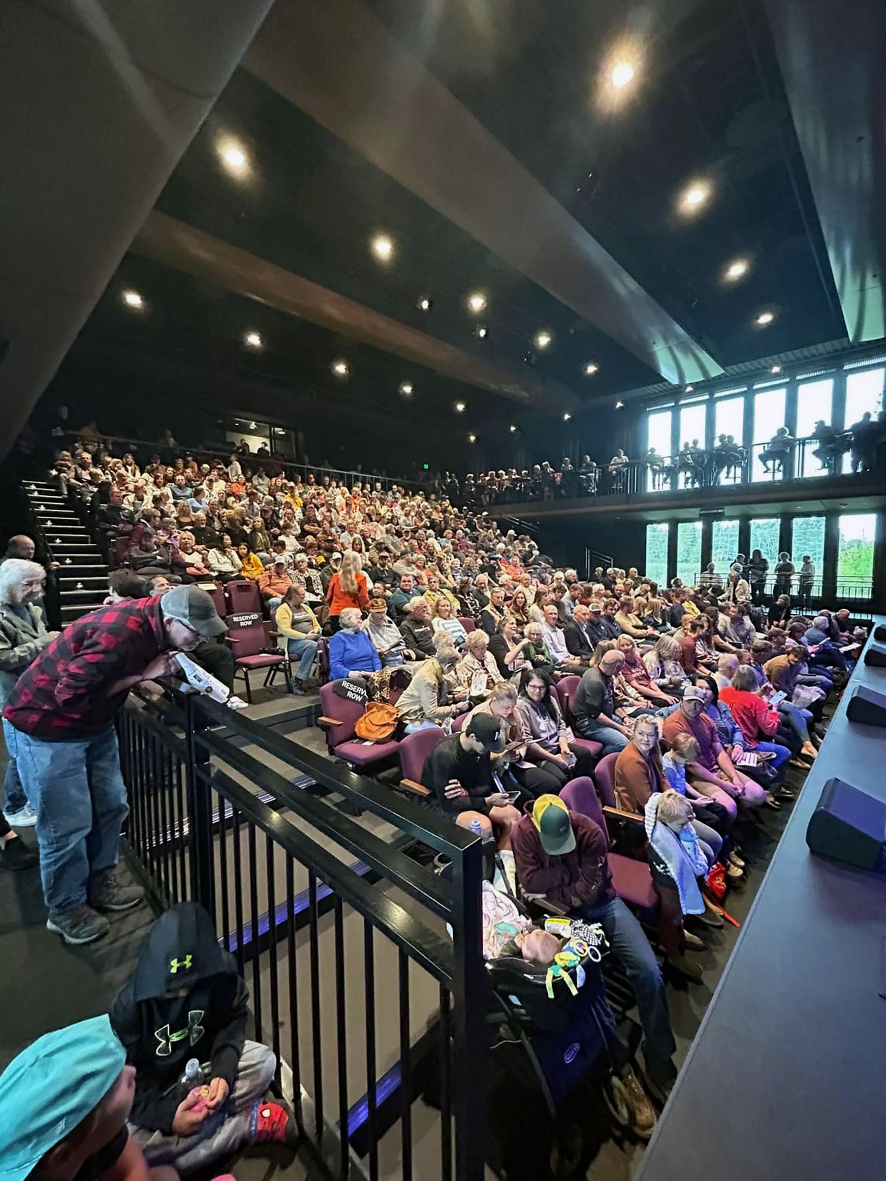 An auditorium full of people.